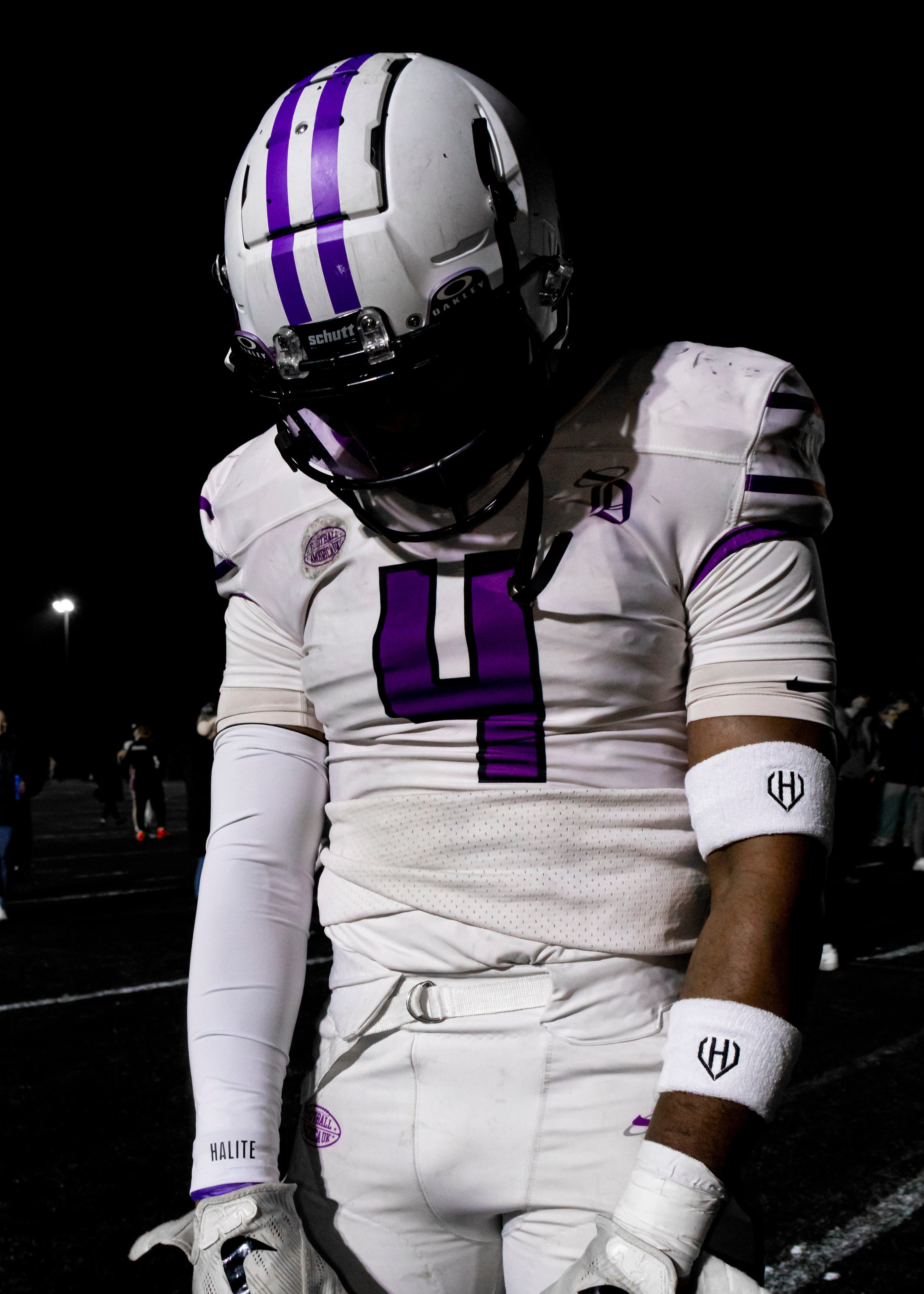 Delta arm sleeves by Delta Sports, featuring a snug fit and sleek design, ideal for football players on the field.